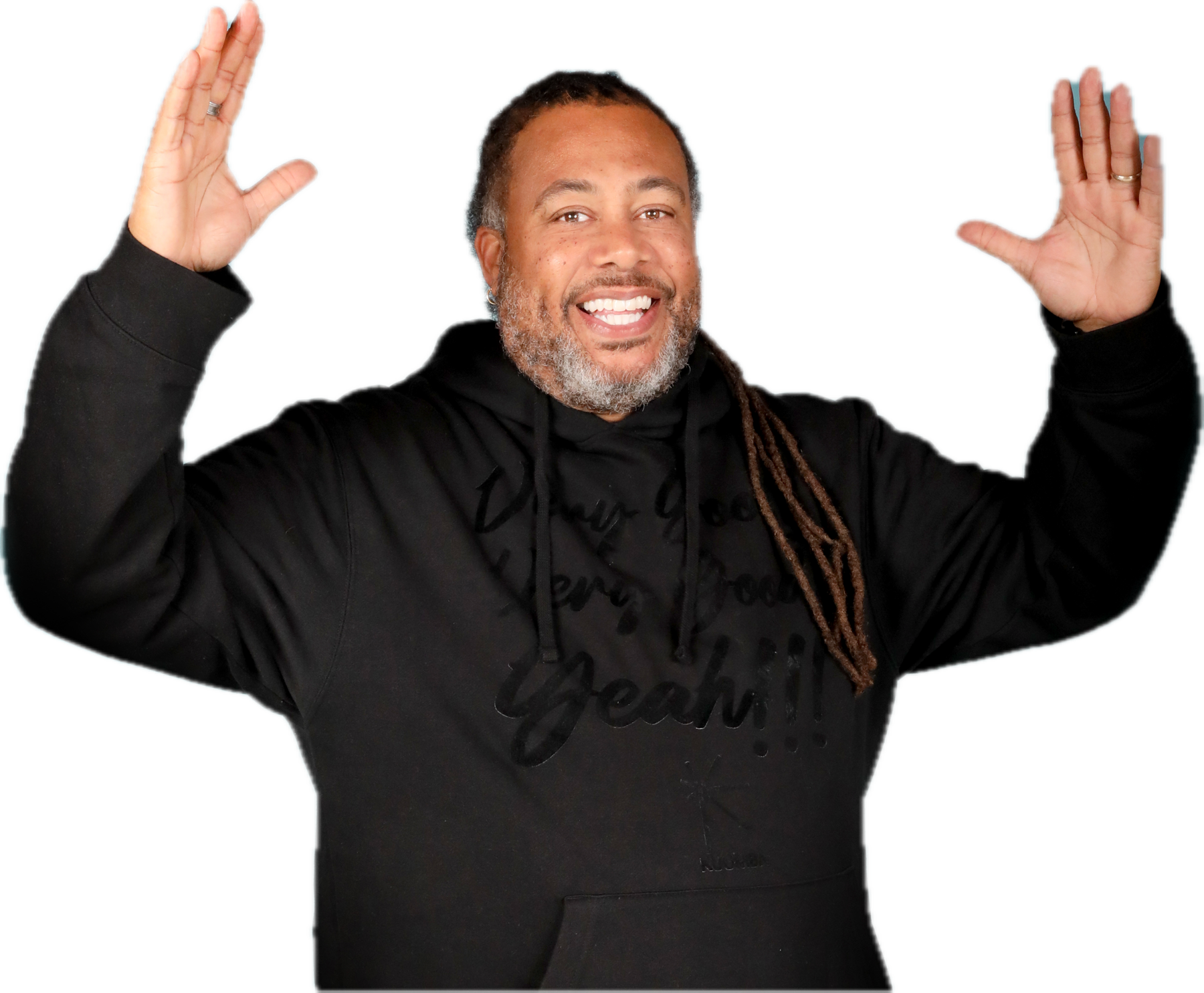 Dr. Harvey Hinton III, arms raised, laughing.